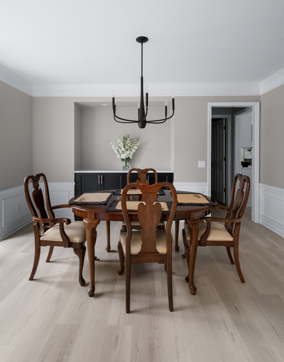 Dining Room - after: Medallion Cabinetry Wallace door style in Oak painted Carriage Black