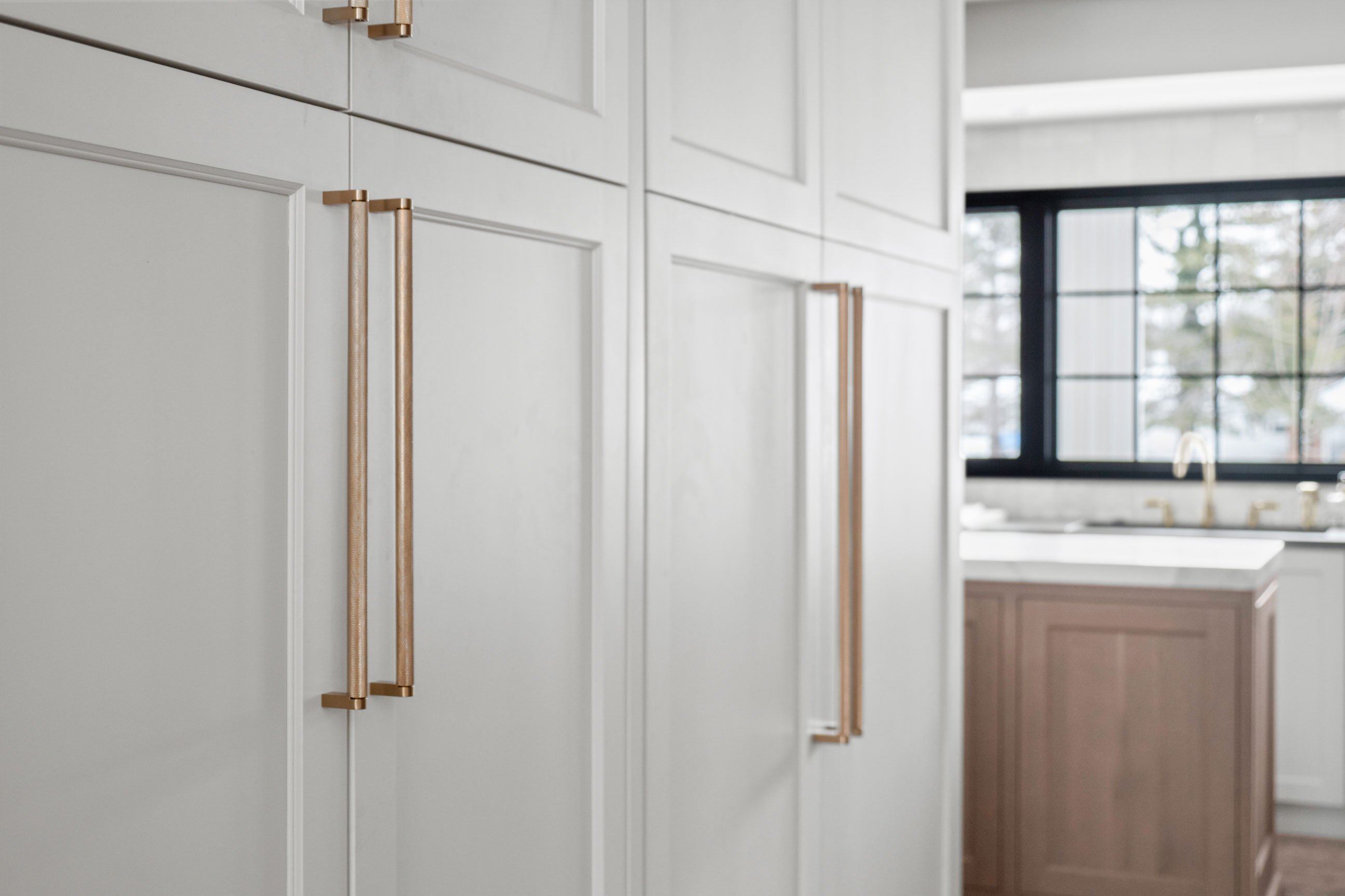 Inspira Cabinetry in Concordia door style painted Heron Plume matte