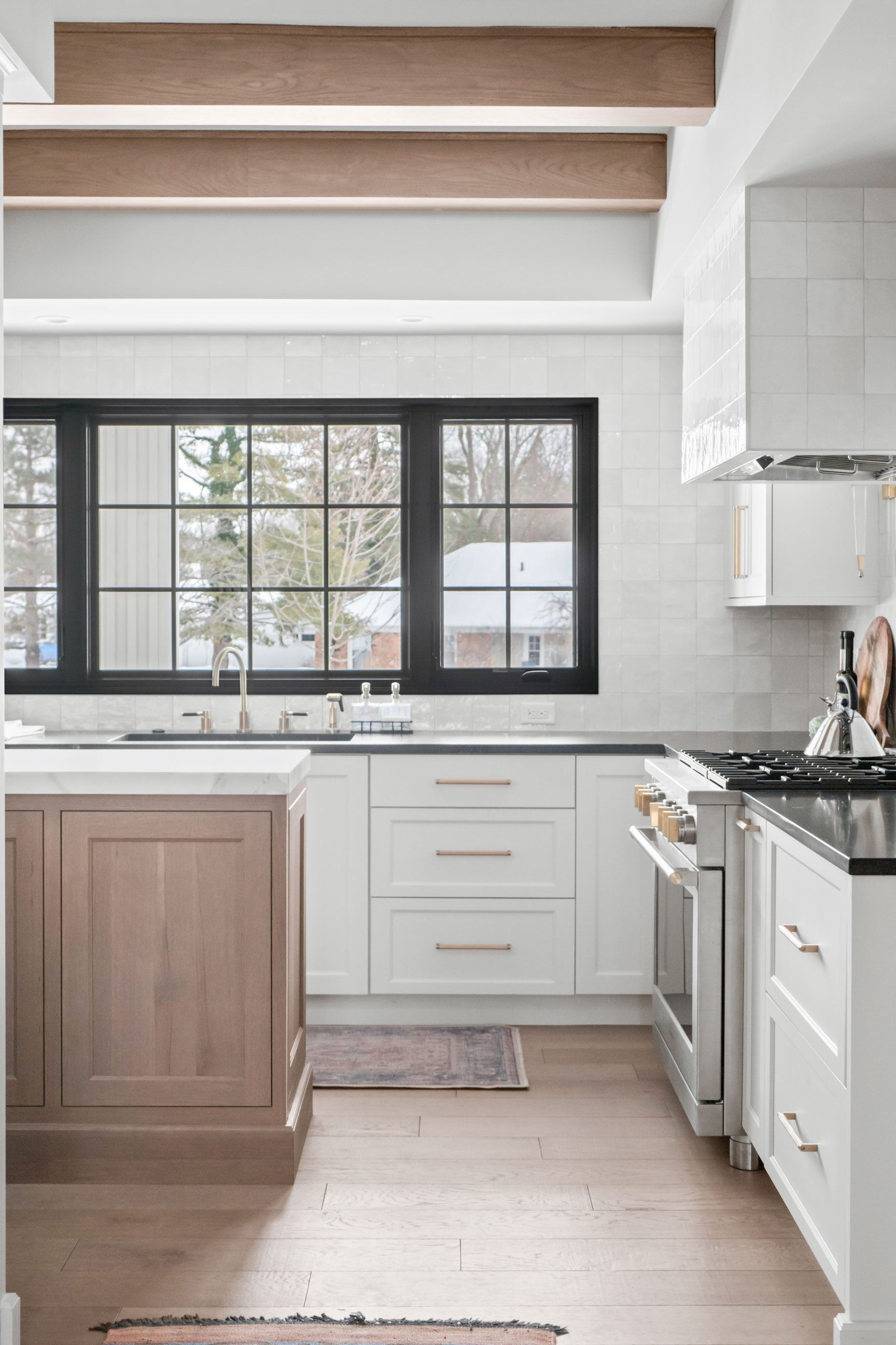 Mix of Inset and Full Overlay Inspira Cabinetry, granite and porcelain tops, and hardwood flooring