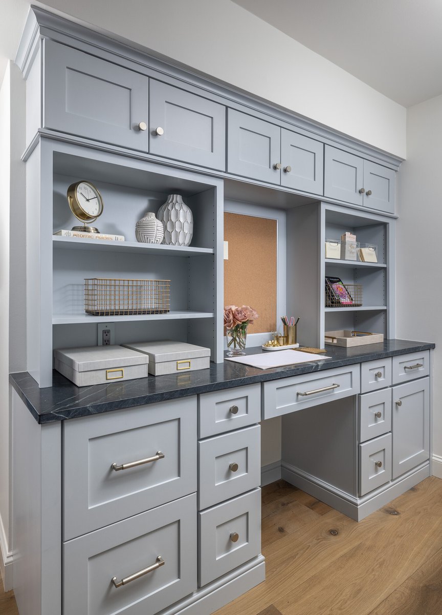 Desk and pantry cabinetry tie into kitchen selections