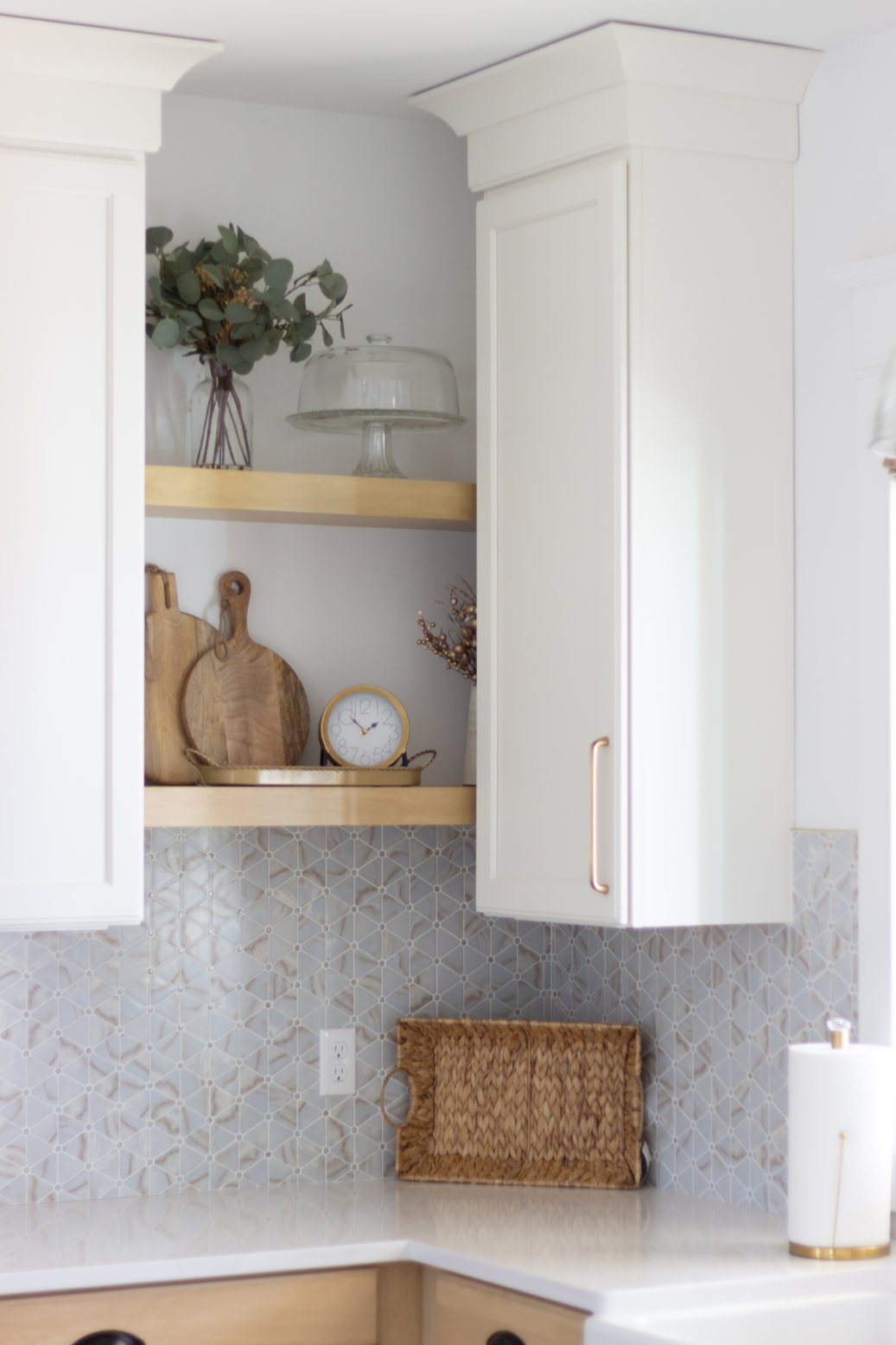Kitchen corner cabinets and shelves featuring kitchen decor