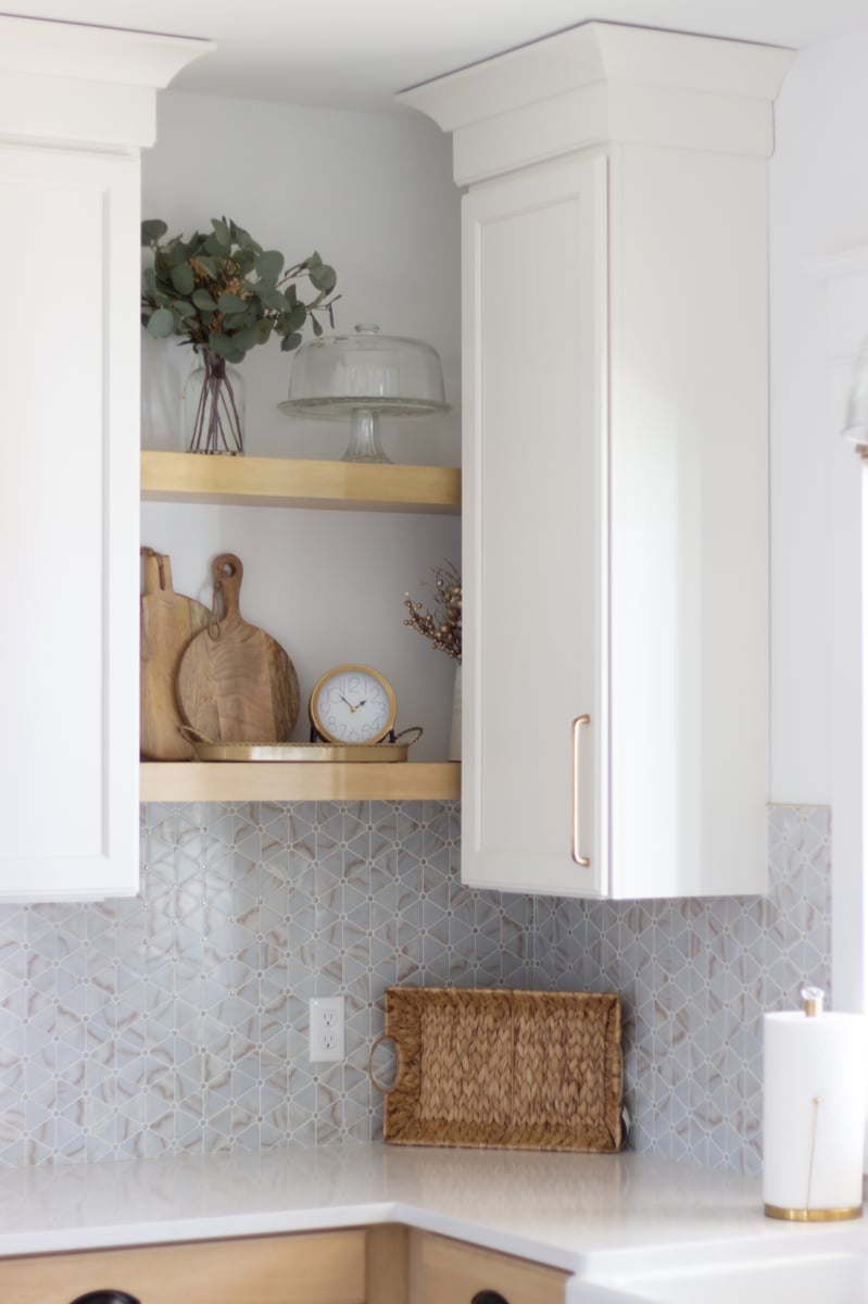 Kitchen corner cabinets and shelves featuring kitchen decor