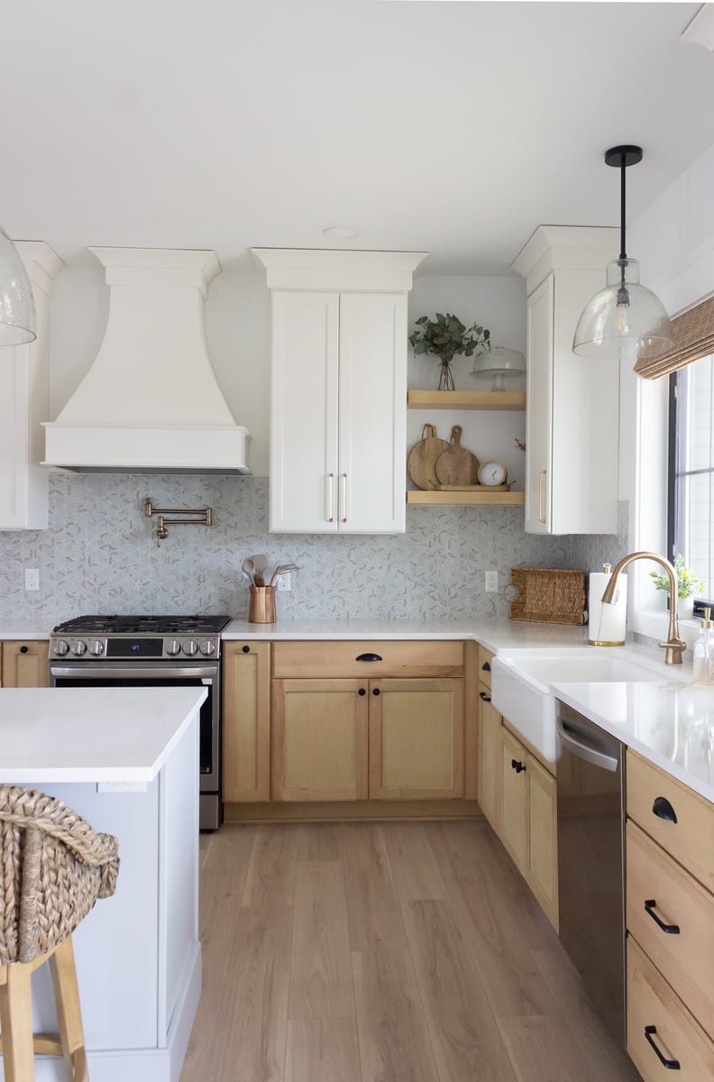 Kitchen view of the sink, detailed corner, and range