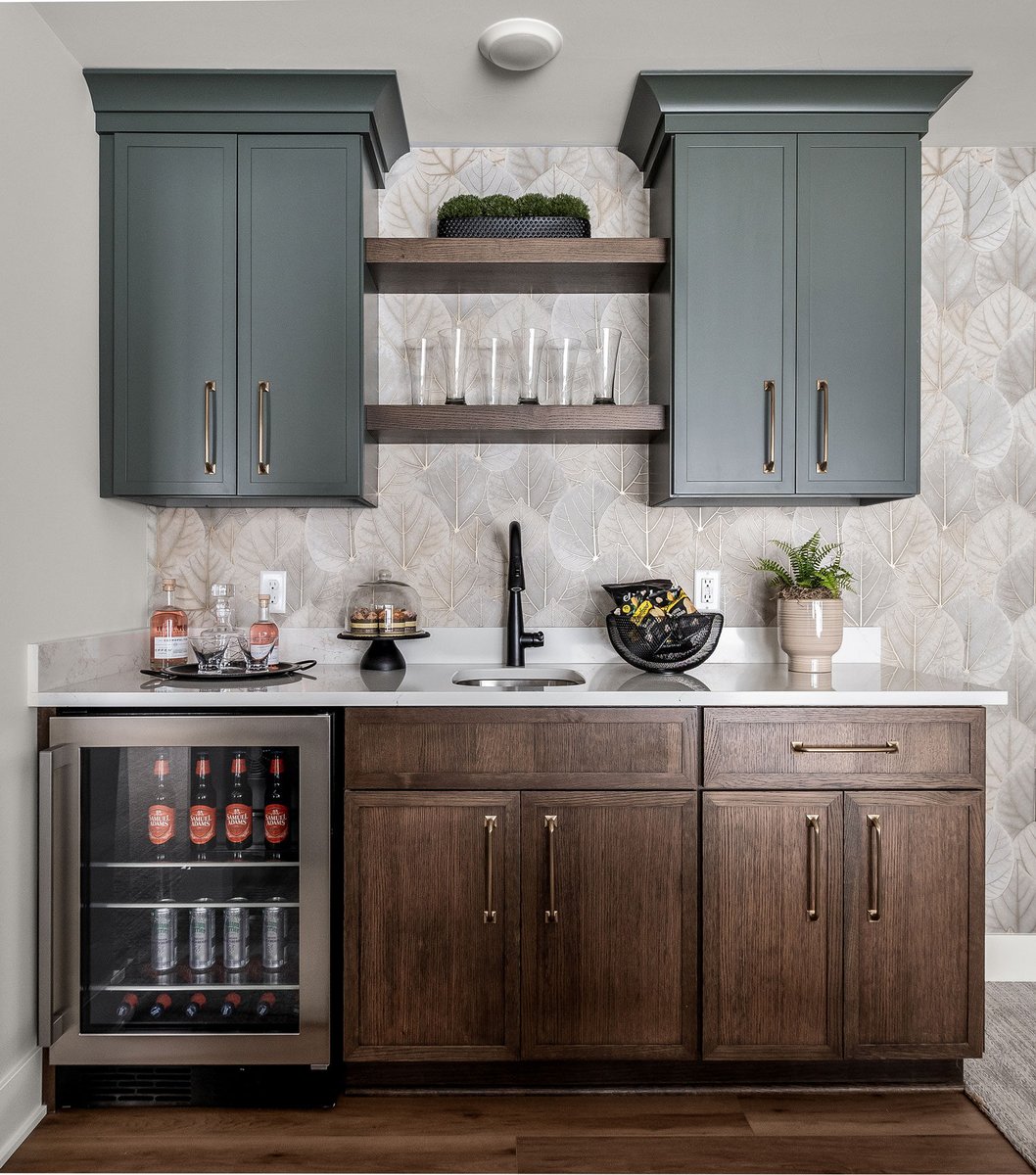 Pioneer Cabinetry - Medford door style in Pewter Green (uppers) and Rift Cut White Oak in Cobblestone (lowers and shelving)