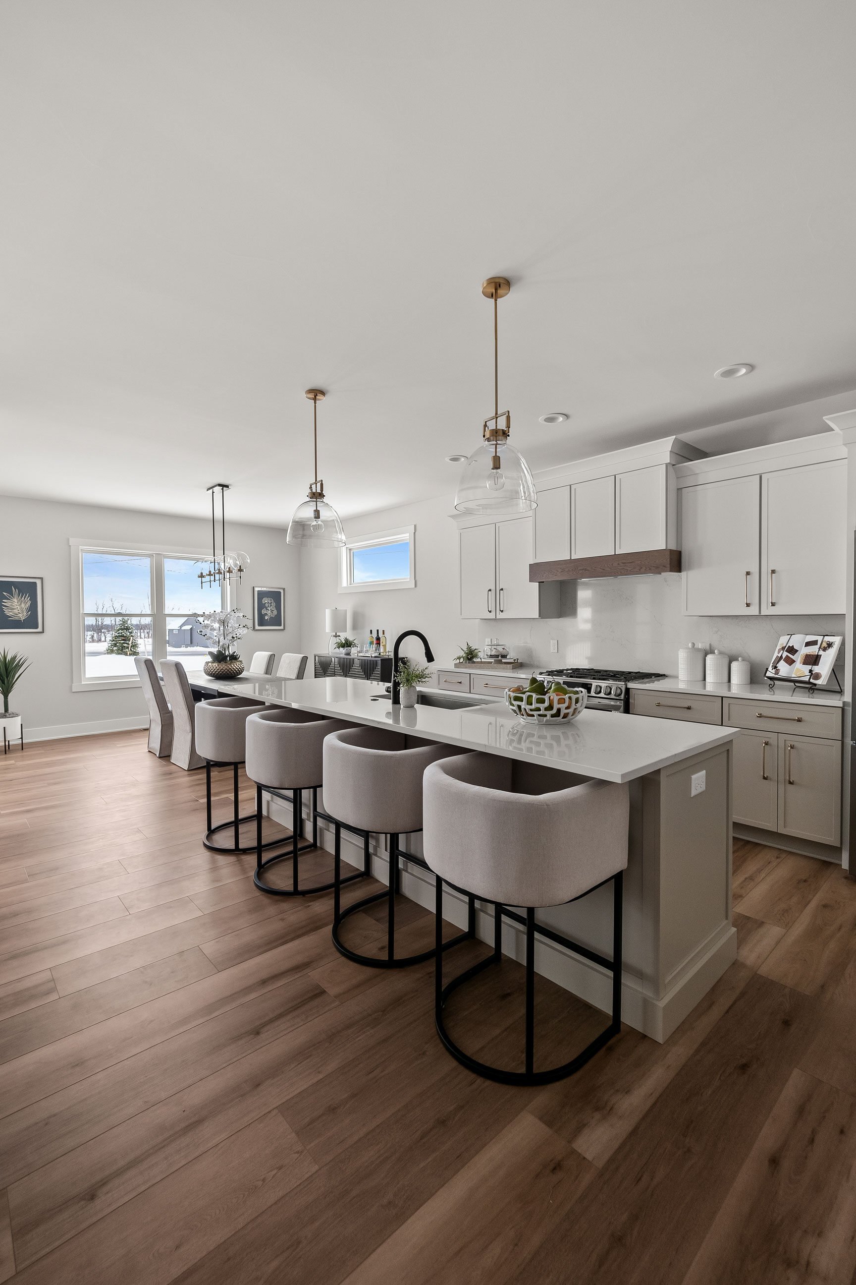 Pioneer Cabinetry - Medford door style in White (uppers) and Mushroom (lowers and island)
