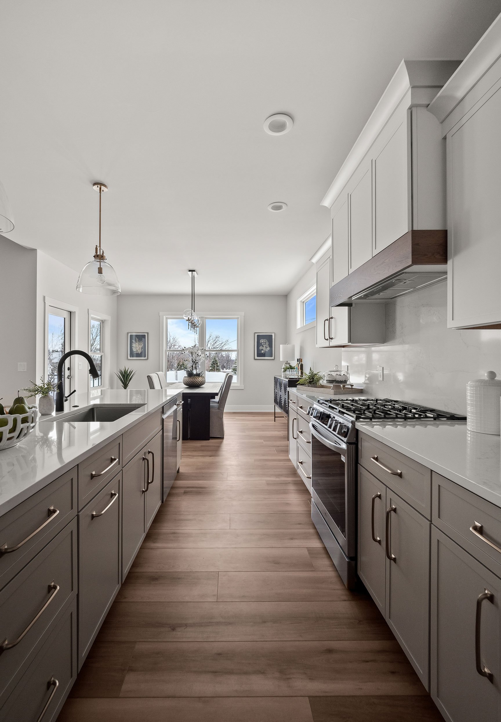 Pioneer Cabinetry - Medford door style in White (uppers) and Mushroom (lowers and island)