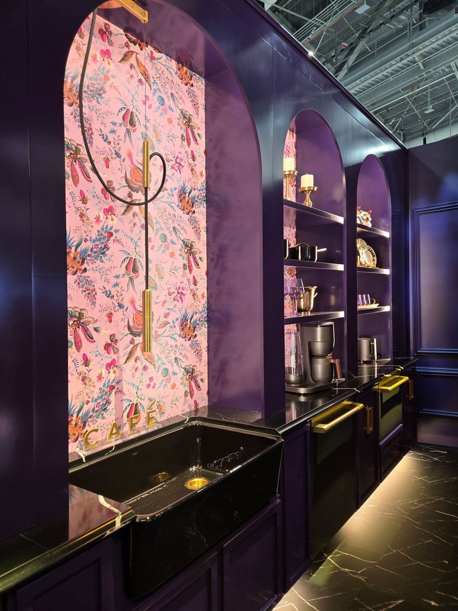 Pinks and purples in cabinetry and wallpaper